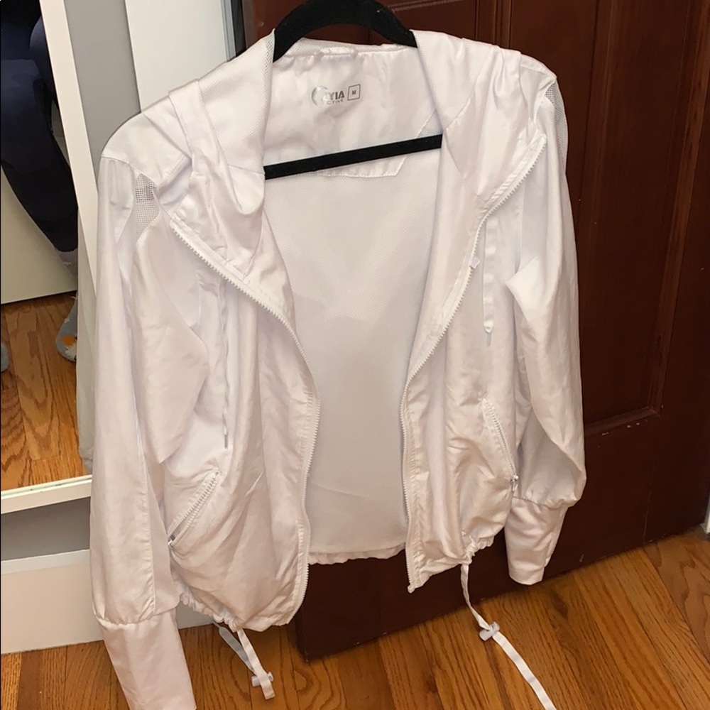 White workout windbreaker